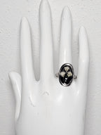 Anillo Nube artesanal con flor natural preservada; material: acero inoxidable, vista 2