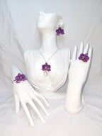 Conjunto de Mini Orquídea Morada artesanal con flor natural preservada; material: acero inoxidable